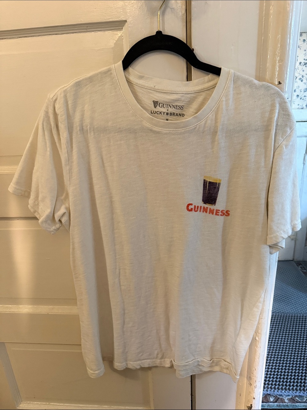 Lucky Brand White Short Sleeve Tee with Red & Purple Guinness Logo